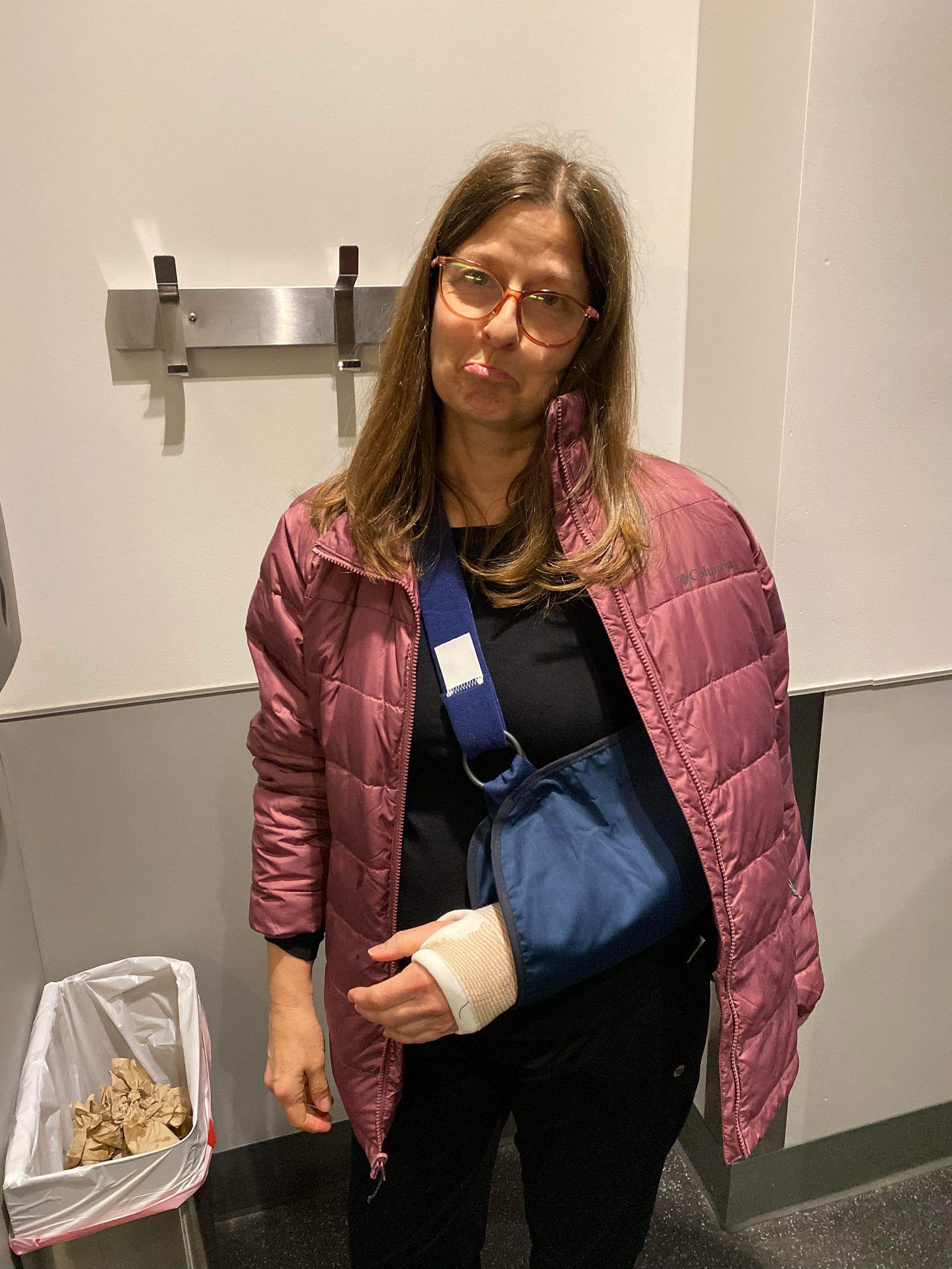 Photo of woman with arm in a sling