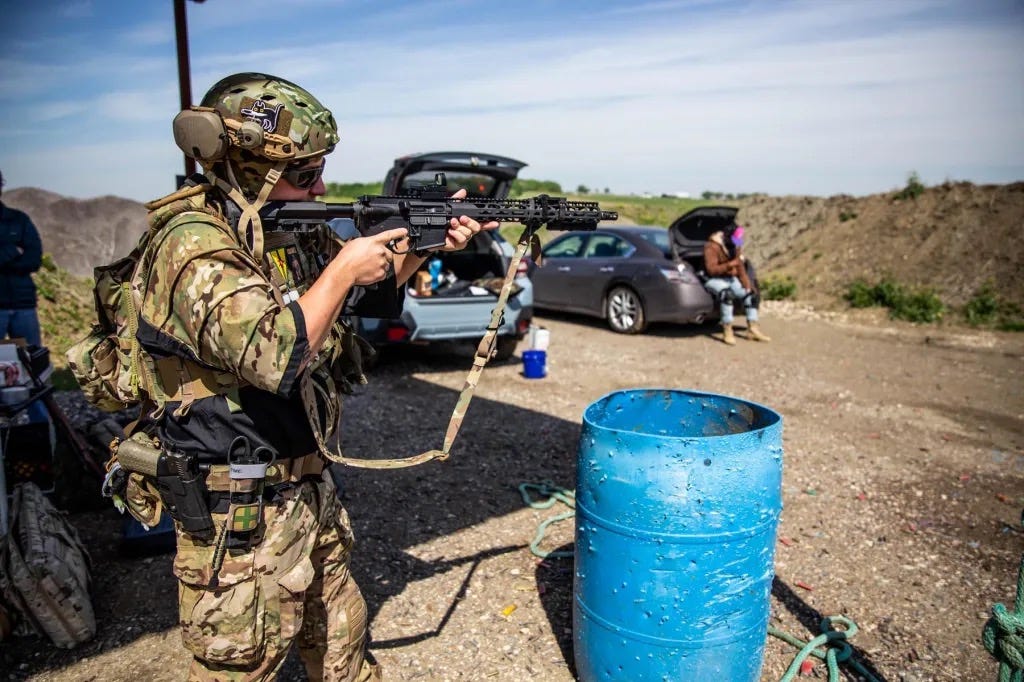 A person in camouflage holding an object

AI-generated content may be incorrect.