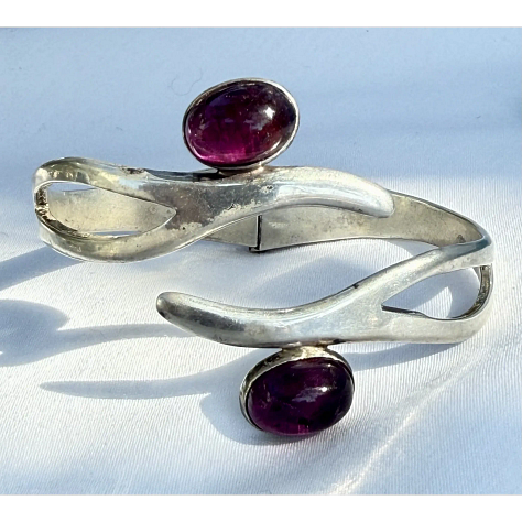https://www.rubylane.com/item/2013583-ABG192/Taxco-Sterling-Floral-Motif-Link-Bracelet
