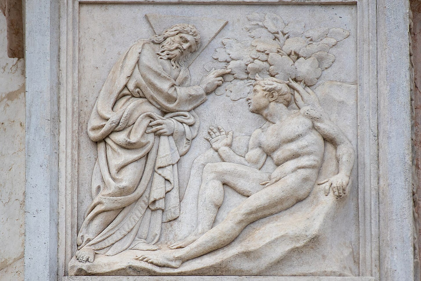 Jacopo della Quercia, Creation of Adam, marble relief on the main doorway of San Petronio, Bologna, 1425 to 1438.