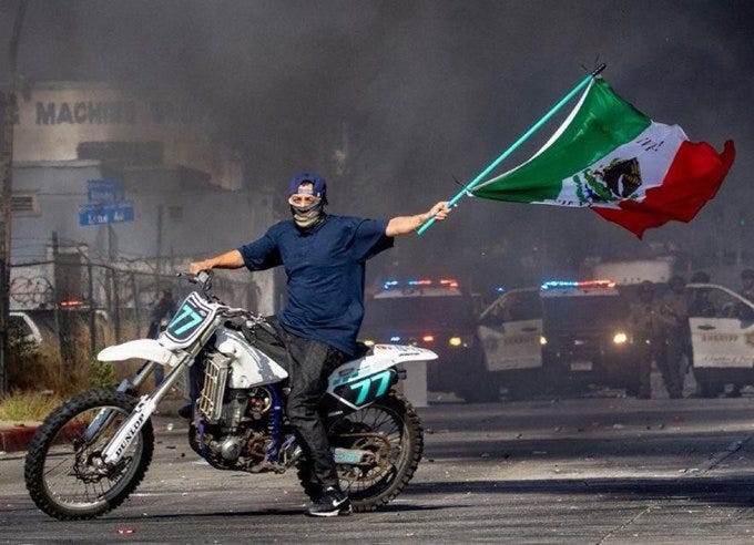 May be an image of 1 person, dirt bike, motorcycle and text