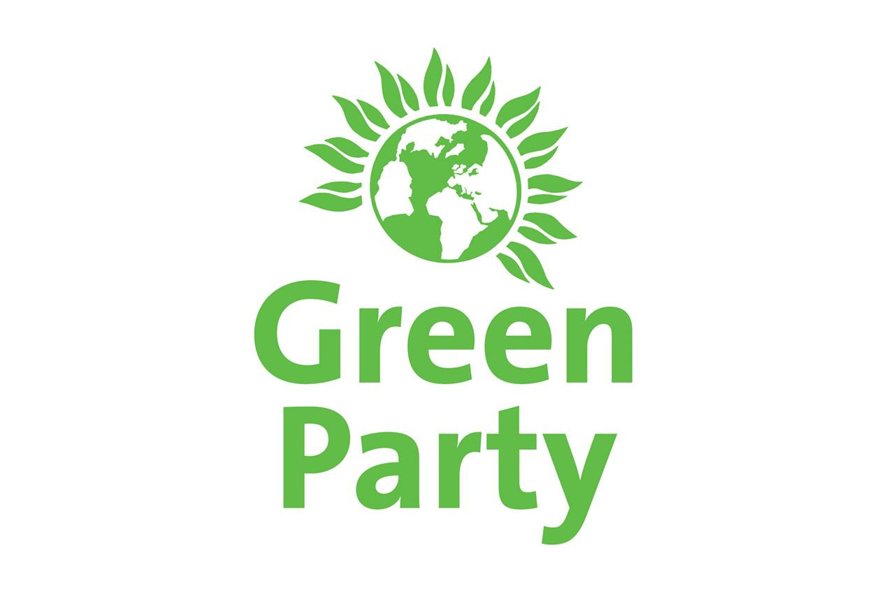 The official Green Party of England and Wales logo — a green globe encircled by leaf-shaped rays forming a sunflower, above the words Green Party in bold green text — used in The Almighty Gob's forensic analysis of the party ahead of the May 7 2026 local elections.
