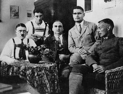 Adolf Hitler (left), Rudolf Hess (2nd from. right) and colleagues at Landsberg Prison, 1924.