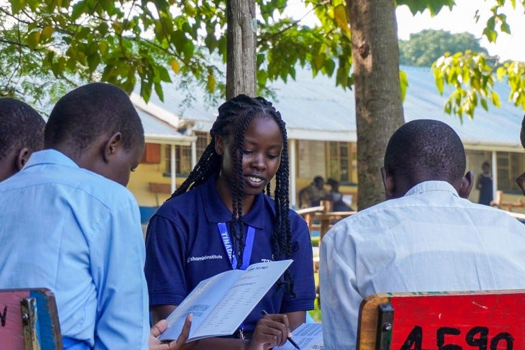 A group of students and a mentor at a Shamiri Event Group Discussion at a girls school in Kisumu, Kenya. A group of students and a mentor at a Shamiri Event Group Discussion at a girls school in Kisumu, Kenya.