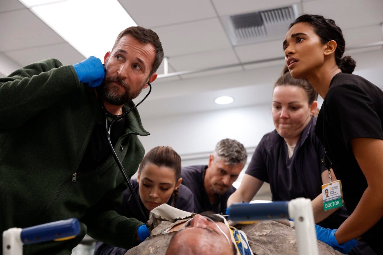 Noah Wyle (left) and other cast members on ‘The Pitt.’
