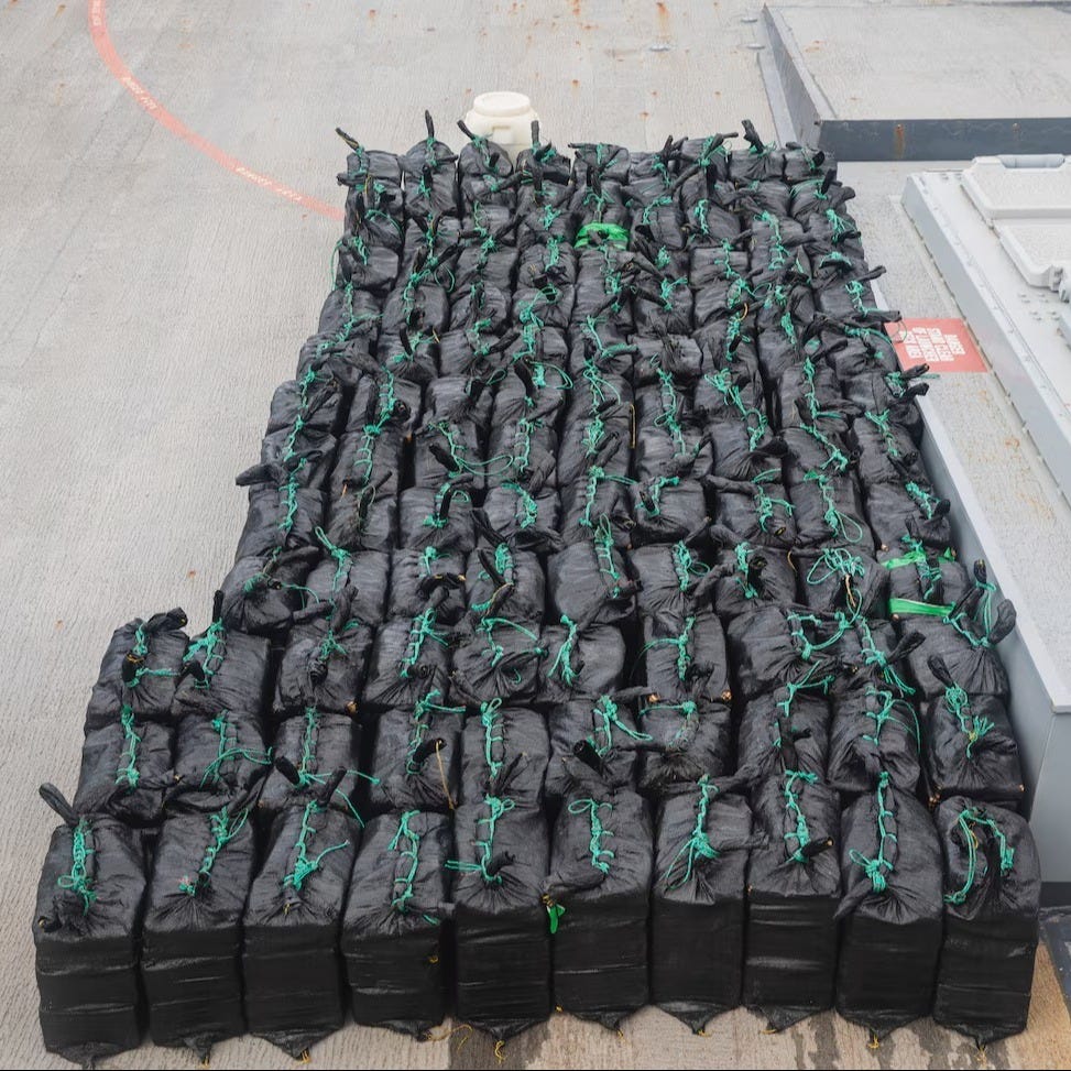 7,850 pounds of cocaine worth $58.1 million, on the deck of the USS Samson after being seized in the Eastern Pacific.