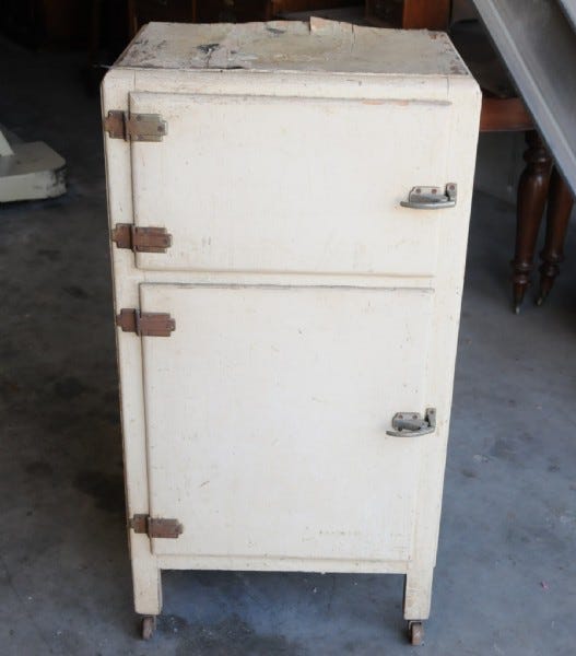 A white cabinet with two doors

AI-generated content may be incorrect.