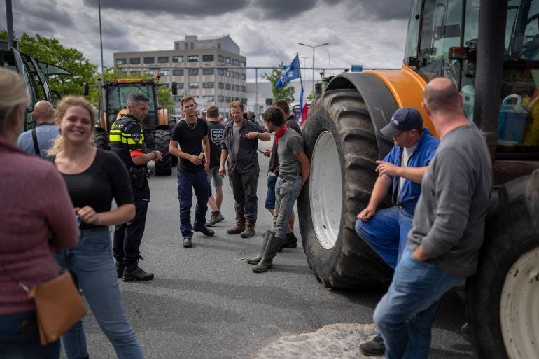 Dutch farmers block food warehouses over new environmental rules | News | Al Jazeera Dutch farmers block food warehouses over new environmental rules | News | Al Jazeera