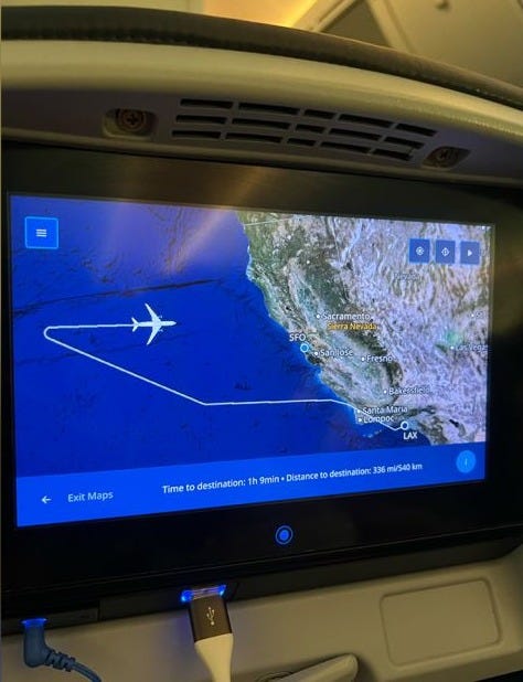 An inflight screen on United Airlines Flight 198, shot by Yang Shuhan, shows the plane diverting to SFO. An inflight screen on United Airlines Flight 198, shot by Yang Shuhan, shows the plane diverting to SFO.
