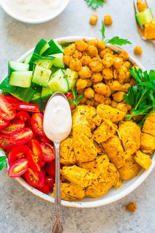 Easy Chicken Shawarma Salad Bowls - An EASY version of chicken shawarma that's fast, HEALTHY, and delish!! Fragrant spices, juicy lemony chicken, fresh veggies, and a tangy Greek-yogurt sauce that's cooling and PERFECT!! Easy Chicken Shawarma Salad Bowls - An EASY version of chicken shawarma that's fast, HEALTHY, and delish!! Fragrant spices, juicy lemony chicken, fresh veggies, and a tangy Greek-yogurt sauce that's cooling and PERFECT!!