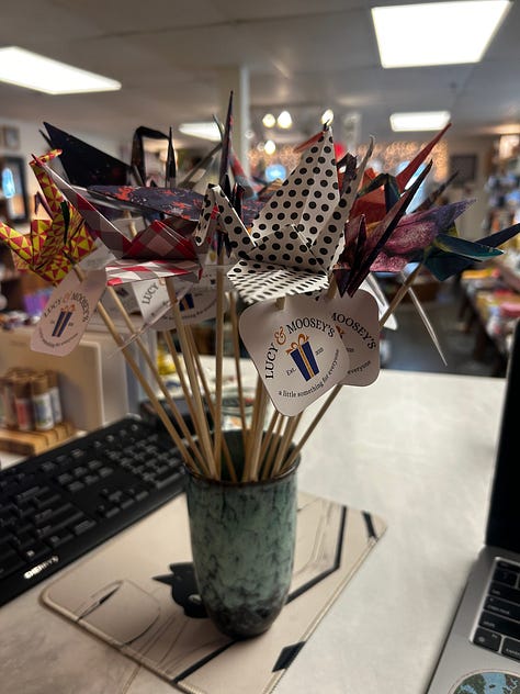 connecting the dots between yoga with Freya and giving away cranes on a stick