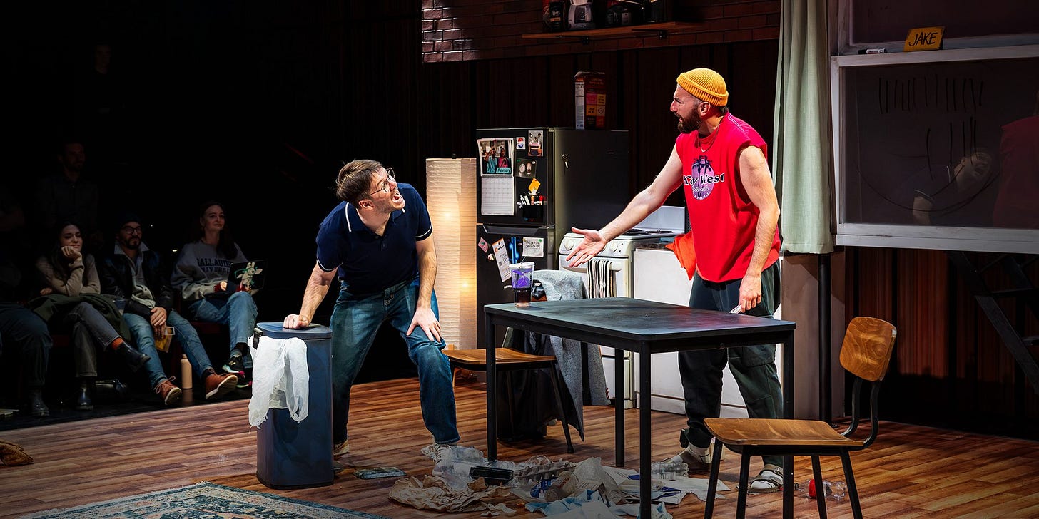 Two white roommates yell at each other in a play set in a home with garbage spilled on the floor. Two white roommates yell at each other in a play set in a home with garbage spilled on the floor.