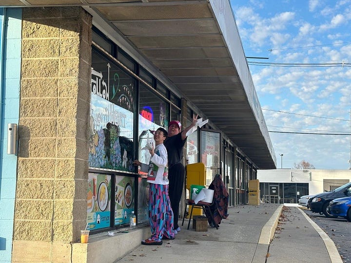 L to R: two individuals smiling and waving  in the sun as they paint a restaurant window; a take out bag being held by an outstretched arm with a restaurant in the background.