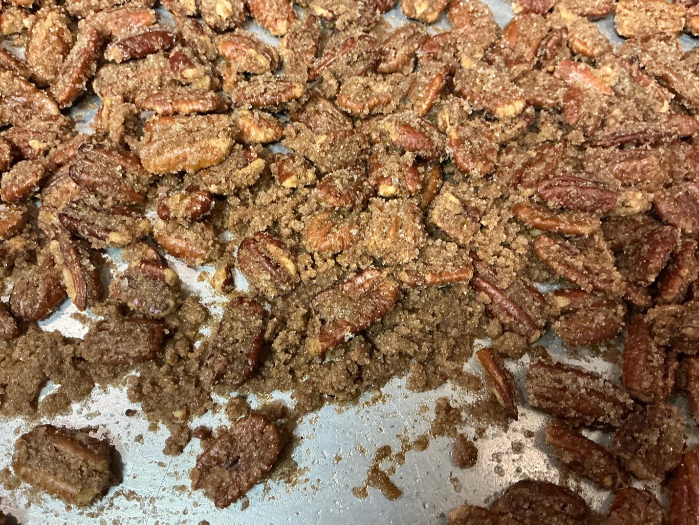 A pile of brown pecans

AI-generated content may be incorrect.