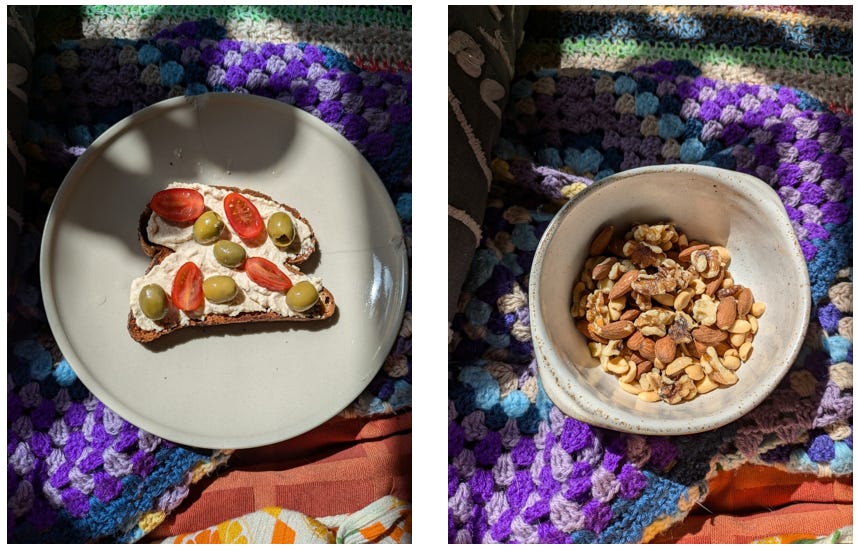ID. Left. A photo from above of a slice of gf toast topped with hummus, tomatoes and olives. It is on a beige plate which is balanced on colourful crochet blankets on the sofa. Right. A photo from above of a cream coloured ceramic bowl containing mixed nuts. Also balanced on colourful crochet blankets, in a patch of sun that really pops the walnuts. ID. Left. A photo from above of a slice of gf toast topped with hummus, tomatoes and olives. It is on a beige plate which is balanced on colourful crochet blankets on the sofa. Right. A photo from above of a cream coloured ceramic bowl containing mixed nuts. Also balanced on colourful crochet blankets, in a patch of sun that really pops the walnuts.