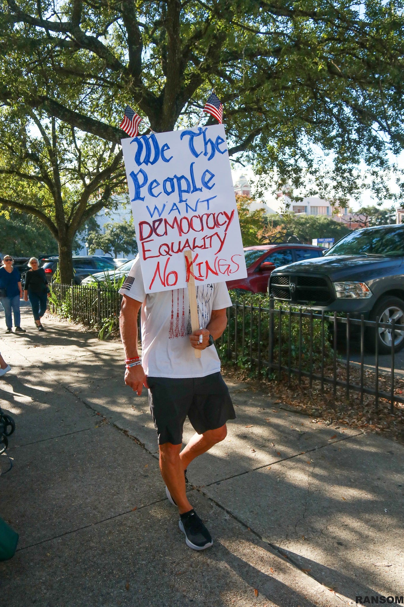 May be an image of text that says 'We The People WANT DEMOCIaCY EoиTy No NoKINES KINGS'
