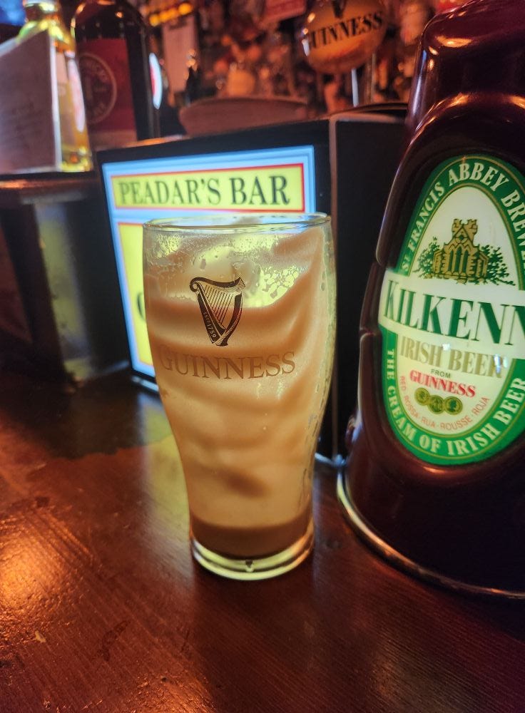 May be an image of text that says "ำบ PEADAR'S BAR GUINNESS ESS ABBEY FRANCIS TE KILKENI IRISH BEEN CHEAMOF 000 RUA ROUSSE IRISHBEEN GUINNESS ROJA PABT OF IRISH"