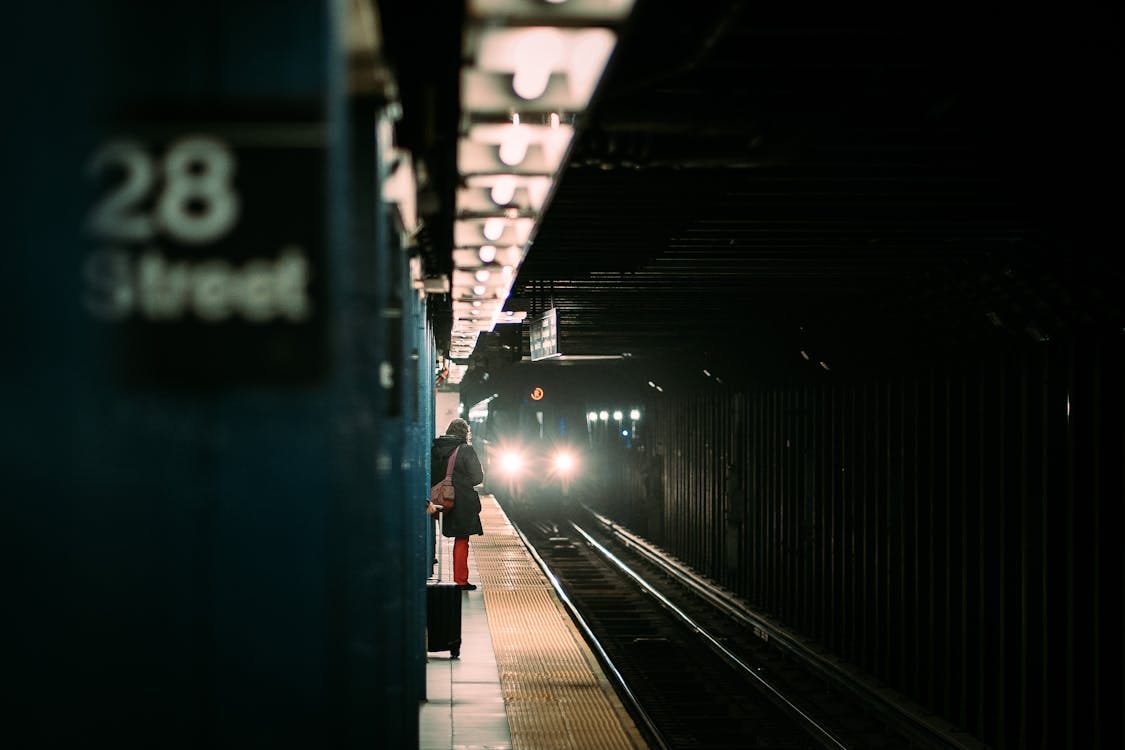 Woman Waiting for a Subway Train Arrival at 28th Street Station in New York  City, USA · Free Stock Photo