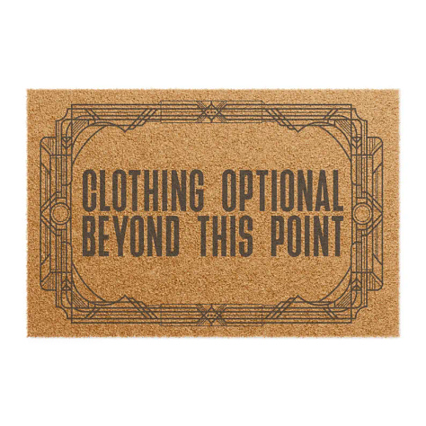 A six-image grid of Planet Nude Etsy products: top left, a humorous beach greeting card showing two giant dinosaurs towering over nude sunbathers; top middle, an amber glass “Live Naked Die Happy” candle; top right, a bright green “Clothing Optional Beyond This Point” T-shirt; bottom left, a purple “Play Naked” pickleball set with two paddles and two yellow balls; bottom middle, a coir doormat reading “Clothing Optional Beyond This Point”; bottom right, a retro-style circular patch showing two nude human figures under stars with the caption “Made From Starstuff.”