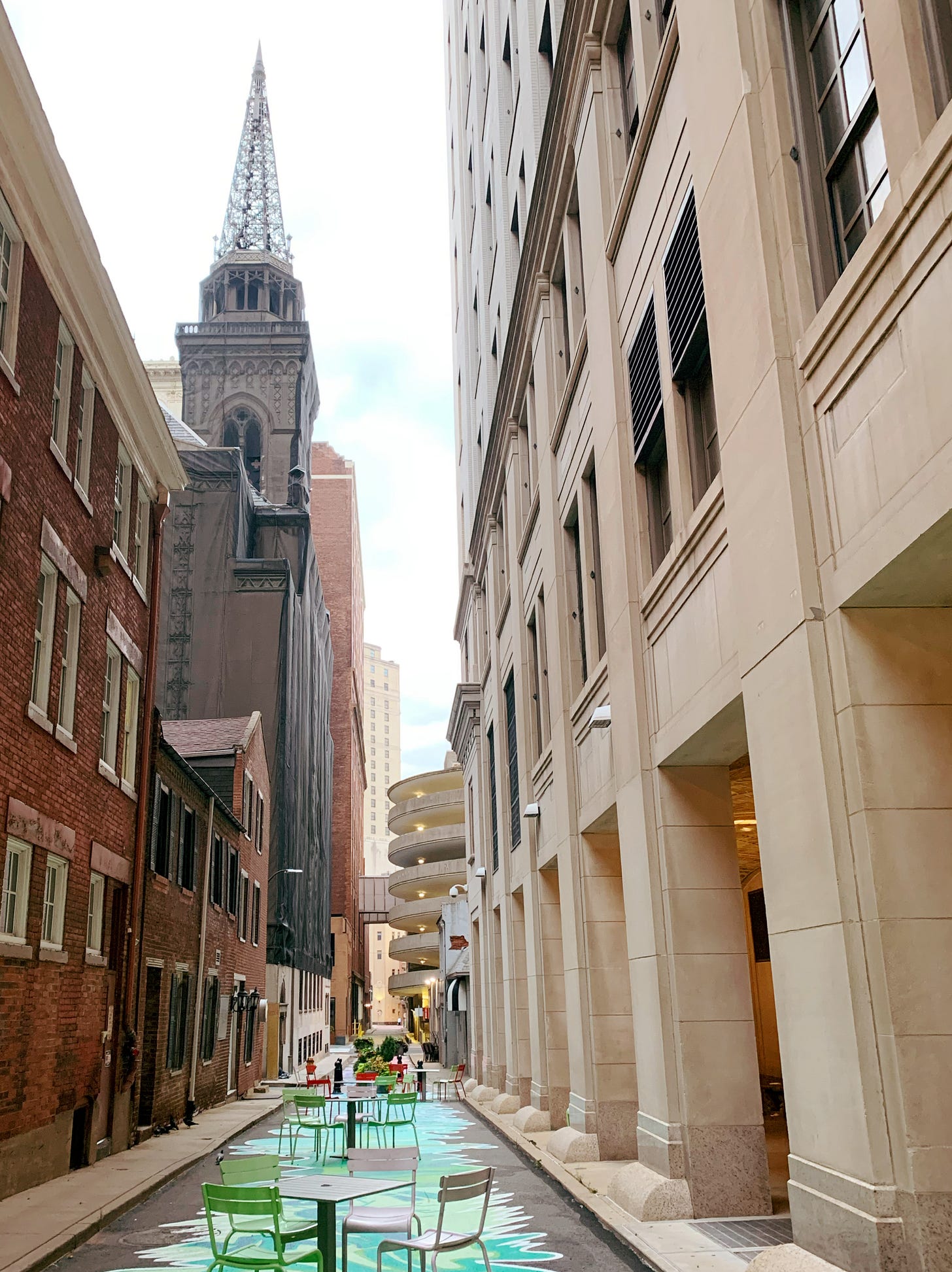 Pedestrian alley downtown Pittsburgh, with painted pavement and tables