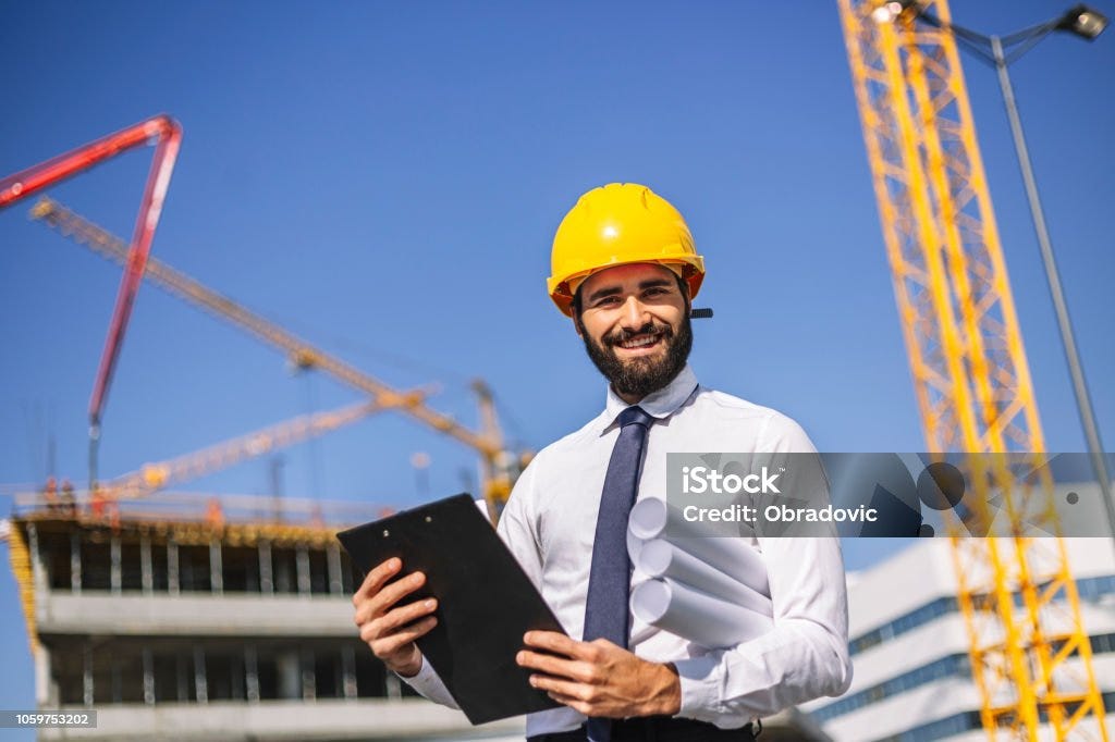 Handsome Contruction Worker At Construction Site Stock Photo - Download ...