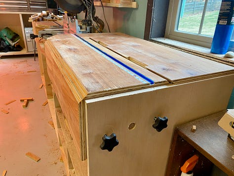 Photo of a miter station with an inlayed T-track and measuring tape, along with a custom stop block. Also a photo of two knobs that lock the flip-top carriage in place.