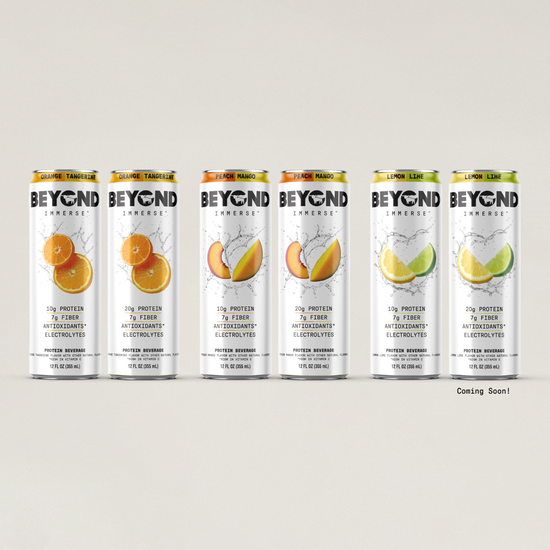 Cans of the "Beyond Immerse" drink; there are six tall silver cans with three different flavors