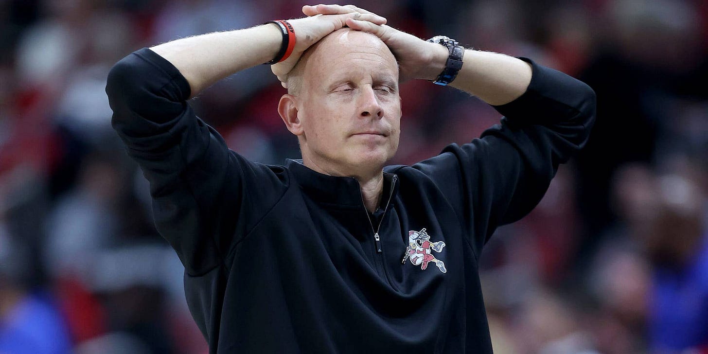 LOUISVILLE, KENTUCKY - DECEMBER 10:  Chris Mack the head coach of the Louisville Cardinals against the DePaul Blue Demons at KFC YUM! Center on December 10, 2021 in Louisville, Kentucky. (Photo by Andy Lyons/Getty Images)