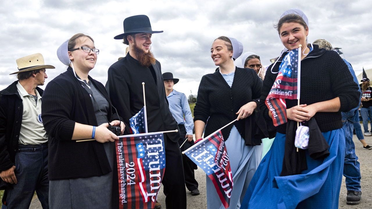 Members of the Old Order Amish community gather for a political rally.