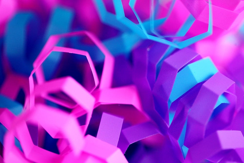 closeup photo of purple and pink decors closeup photo of purple and pink decors