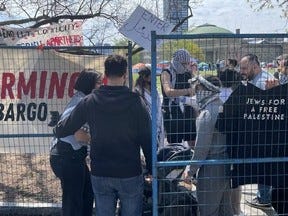 At a border control checkpoint at "Little Gaza" on the University of Toronto campus, marshals inspect and control who can get into the fenced-off anti-Israel city. -- Joe Warmington/Toronto Sun At a border control checkpoint at "Little Gaza" on the University of Toronto campus, marshals inspect and control who can get into the fenced-off anti-Israel city. -- Joe Warmington/Toronto Sun