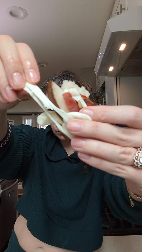 Eating a bite of the bread & close up.