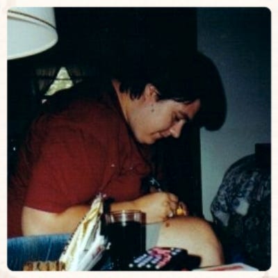 Me making a Rosary in my Grandparents' living room in 1995