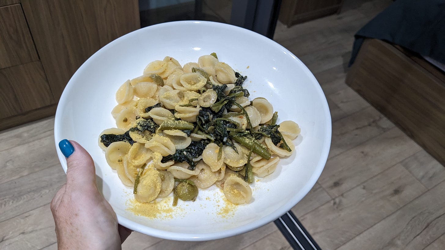 bowl of pasta with greens