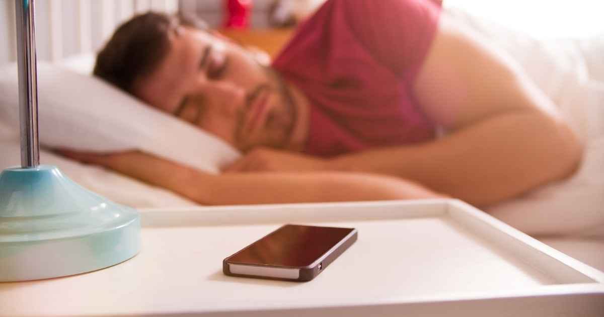 Man asleep in bed