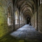 Cathedral of Evora. The cloisters of the cathedral were built between 1317 and 1340 in Gothic style, and shows the influence of the cloisters of Lisbon Cathedral.