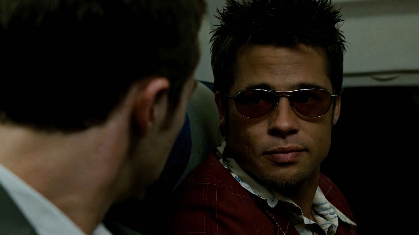 Fight Club | Still features Brad Pitt as Tyler Durden meeting the narrator.