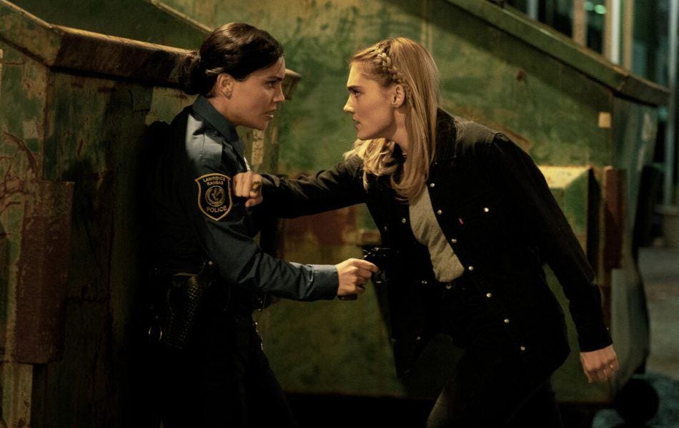 The Winchesters Mary holding back Betty from possession with John. The Winchesters Mary holding back Betty from possession with John.