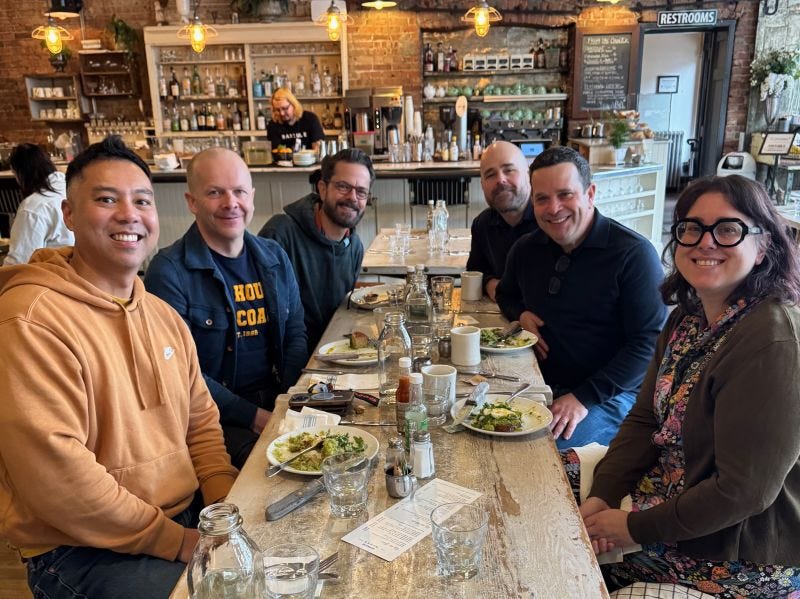Six people enjoy the second edition of Seattle Breakfast Club. 