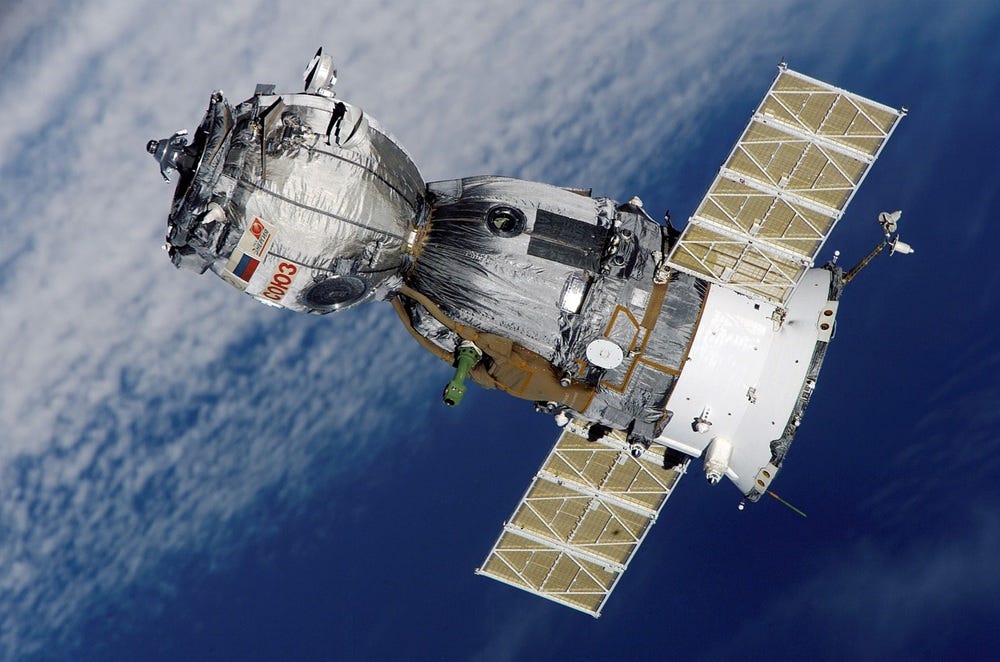 a satellite in orbit above the Earth