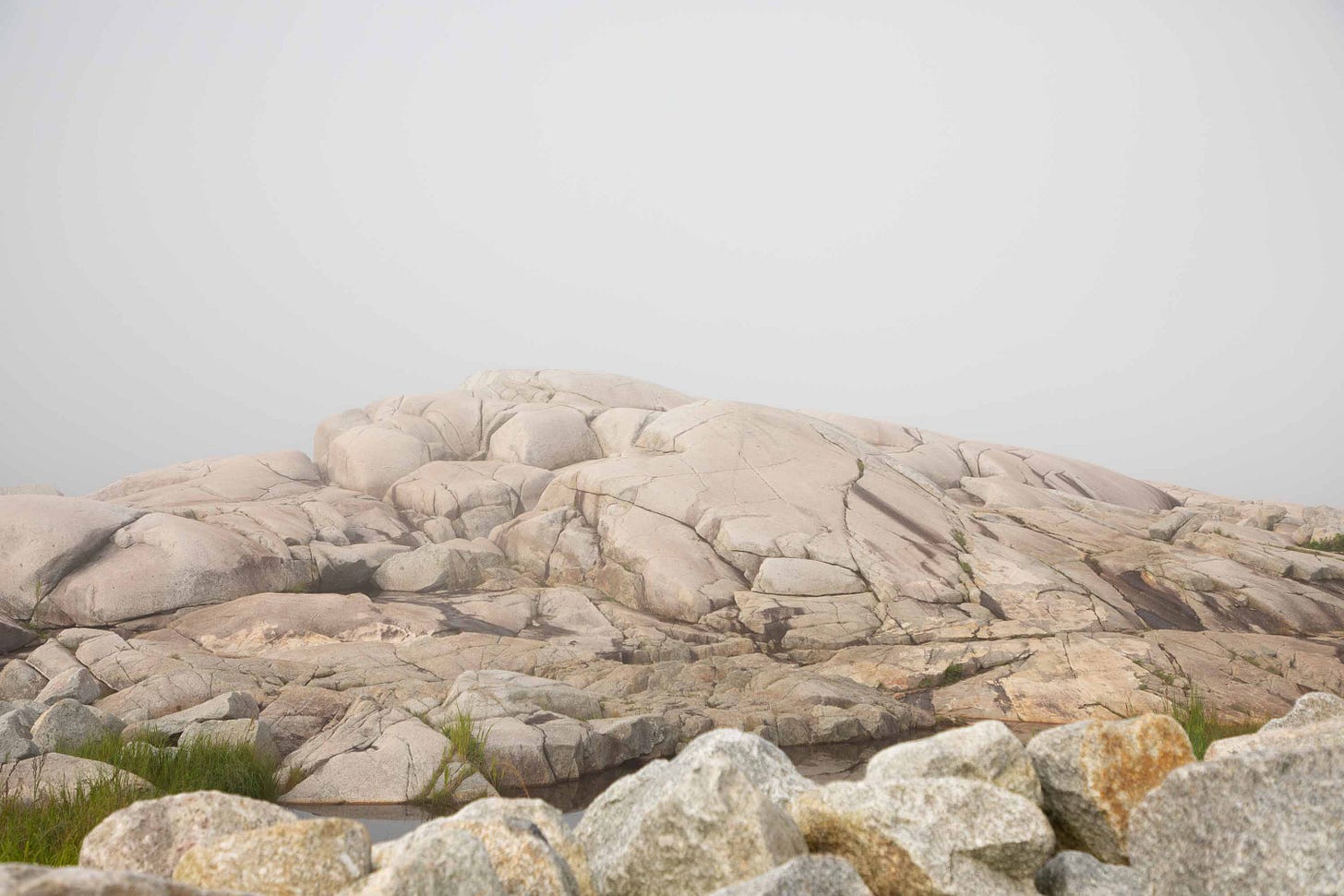 Momentarily tourist-free. Cracks in the rocks at Peggy’s Cove in Nova Scotia were carved bu glaciers that retreated during the last Ice Age, some 12,000 years ago. August 11, 2024. West Dover, Nova Scotia. Photo credit: Nancy Forde Momentarily tourist-free. Cracks in the rocks at Peggy’s Cove in Nova Scotia were carved bu glaciers that retreated during the last Ice Age, some 12,000 years ago. August 11, 2024. West Dover, Nova Scotia. Photo credit: Nancy Forde