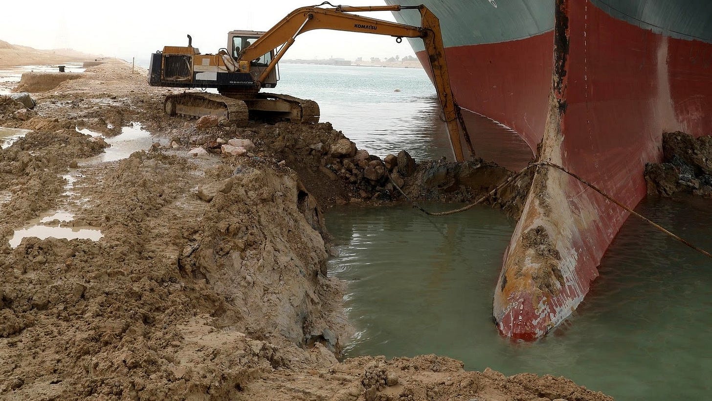 In pictures: Container ship blocking the Suez Canal finally on the move -  BBC News