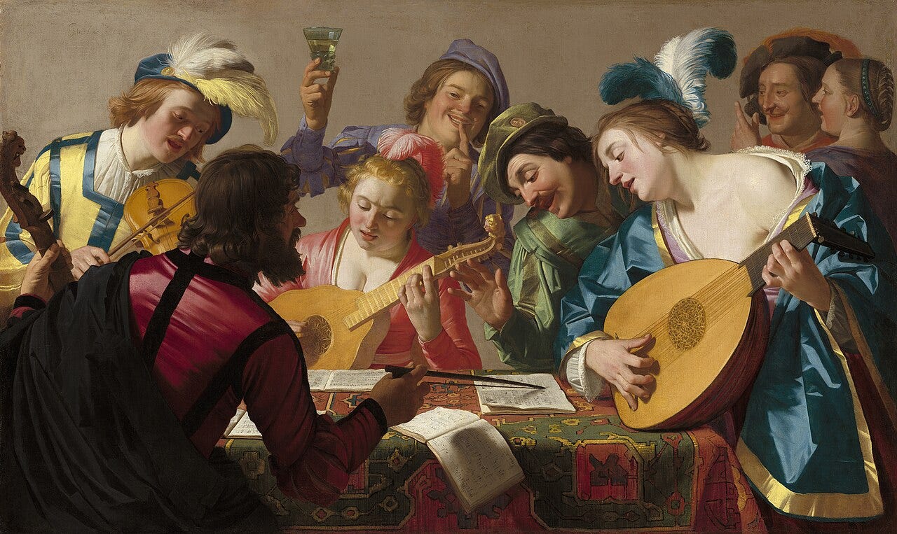 A candlelit group singing around a sheet of music A candlelit group singing around a sheet of music