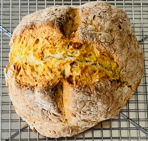 White soda bread dough being mixed with a Swedish dough whisk in a large bowl. Shaped soda bread round with a deep cross cut into the top before baking. Finished Irish white soda bread cooling on a wire rack, golden and crusty.