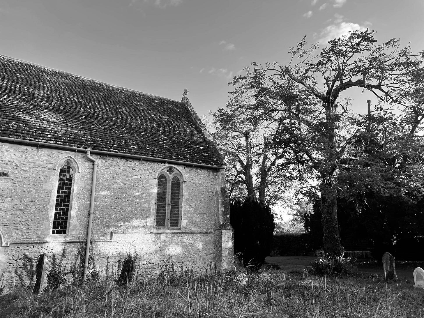 A church building and tree, black and white