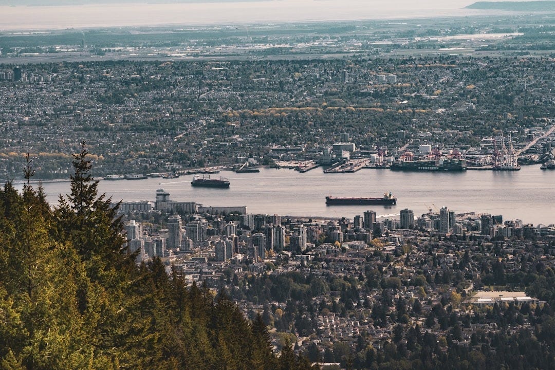 a large body of water surrounded by a city a large body of water surrounded by a city