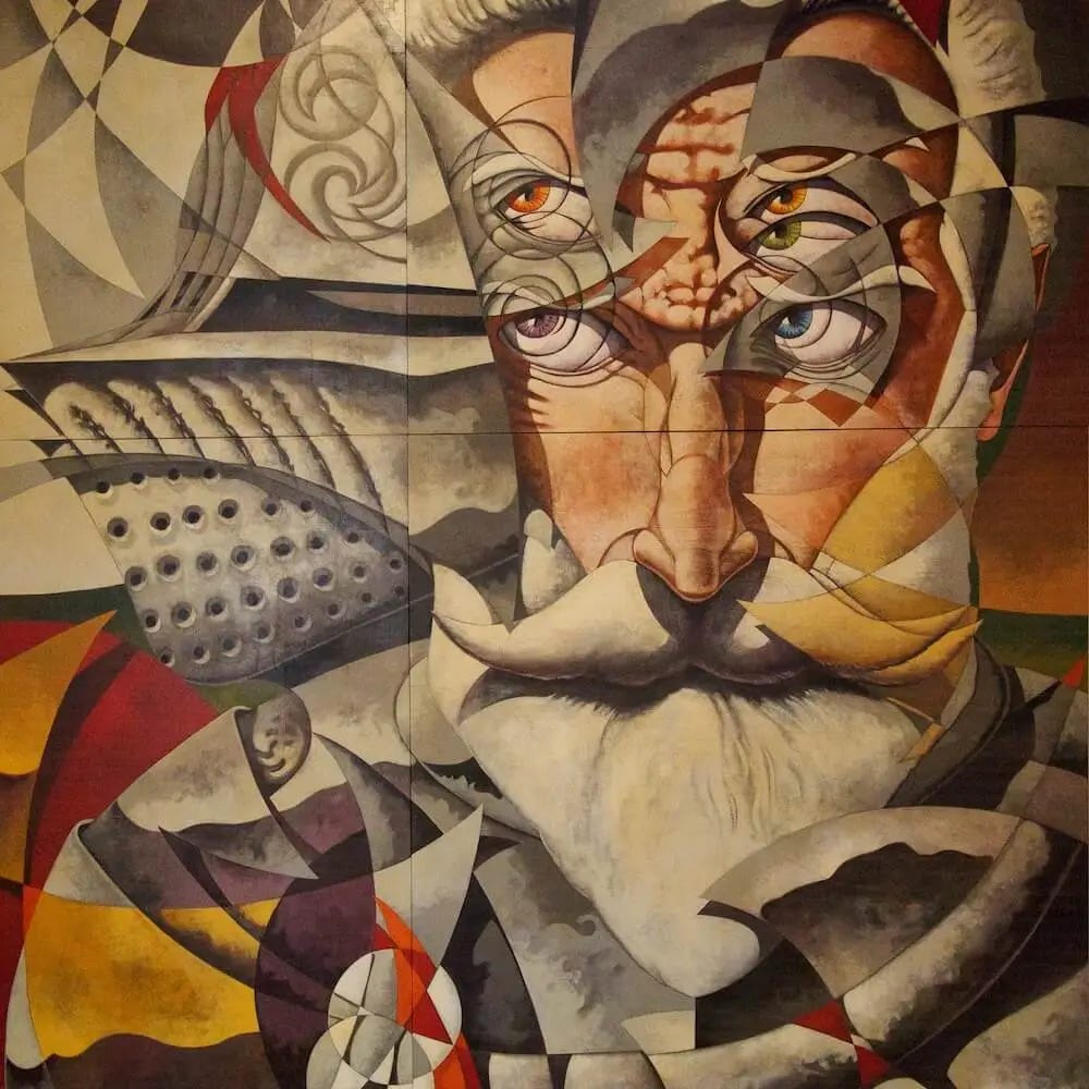 Painting of a man's face with white curled up moustache and beard 