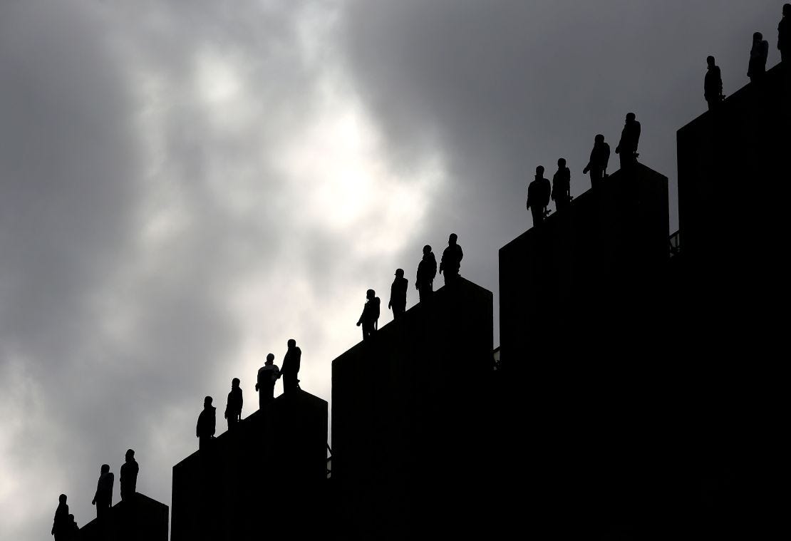 The sculptures were made from packing tape and will remain on rooftops until April 1. The sculptures were made from packing tape and will remain on rooftops until April 1.