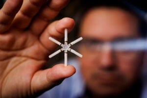 The ingestible capsule is about the size of a multivitamin, and once swallowed, it expands into a star shape that helps it remain in the stomach until all of the drug is released. Credits:Credit: Adam Glanzman