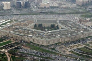 FILE - The Pentagon in Washington, March 27, 2008. The Air Force is betting a large part of its future air warfare on a fleet of more than 1,000 autonomously operated combat aircraft, and later this spring it’s top civilian leader is planning to climb into one of those AI-operated warplanes and let it take him airborne. Air Force Secretary Frank Kendall told senators Tuesday at hearing on the service’s 2025 budget that he is planning on climbing into the cockpit of one of the F-16s that the service has converted for drone flight to see for himself how it performs in the air. (AP Photo/Charles Dharapak, File)